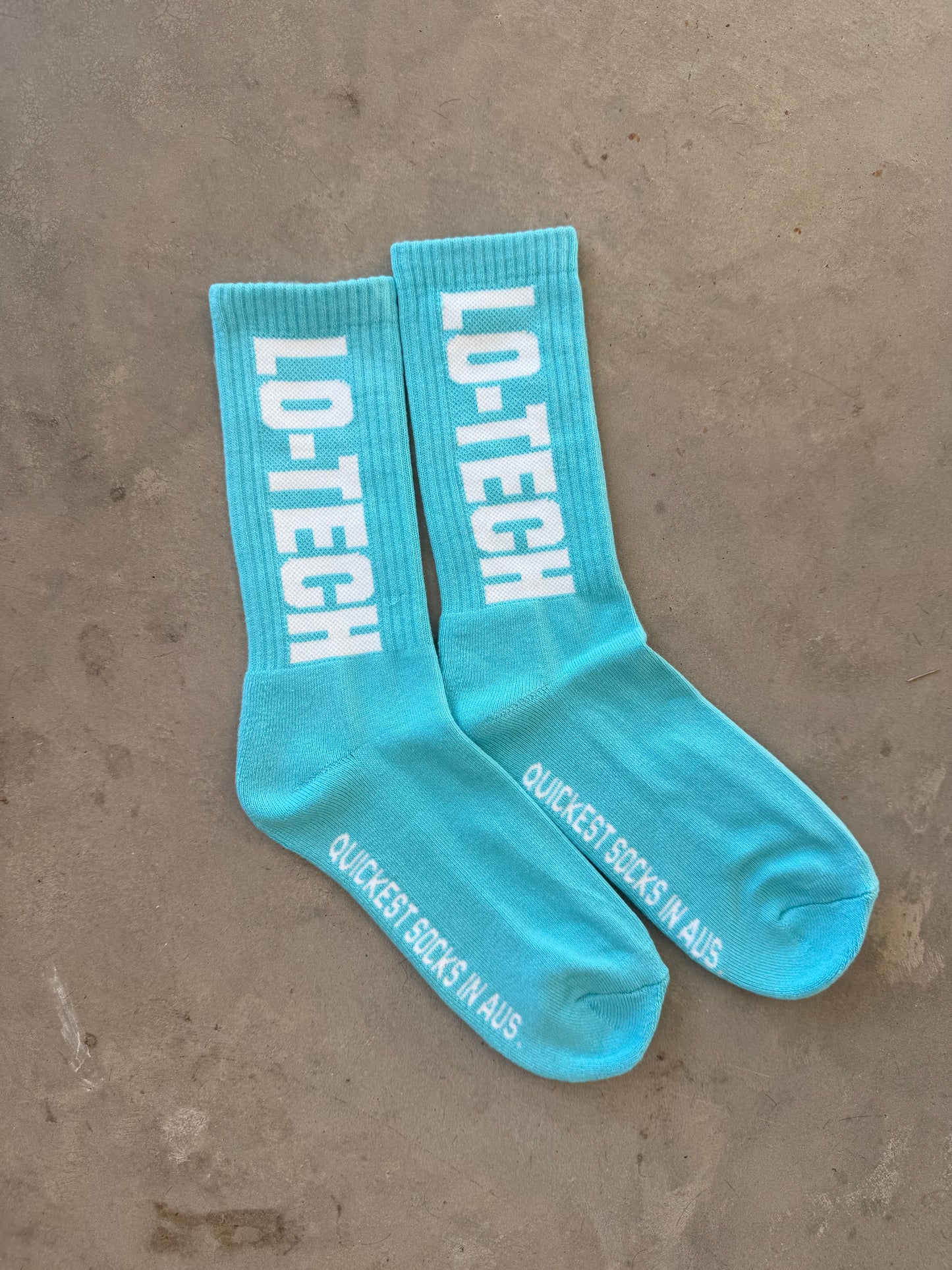 Lo-Tech OG logo (Cotton candy blue, black with cotton candy blue)